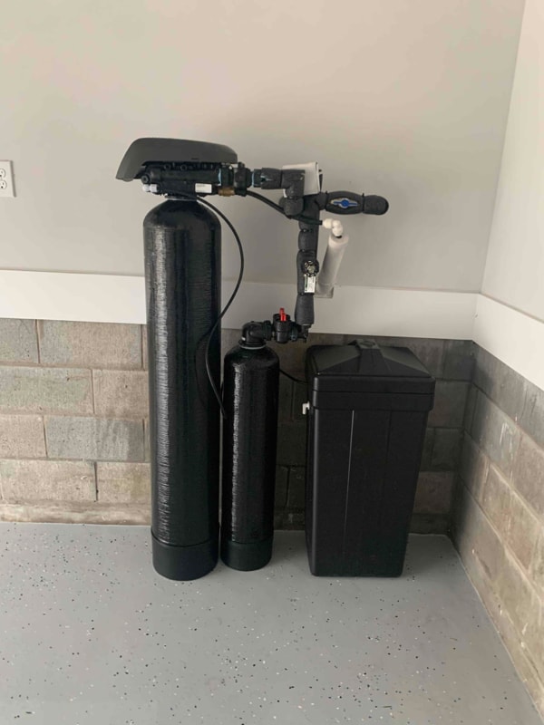 A photo of our 400 series water softener installed in a home.