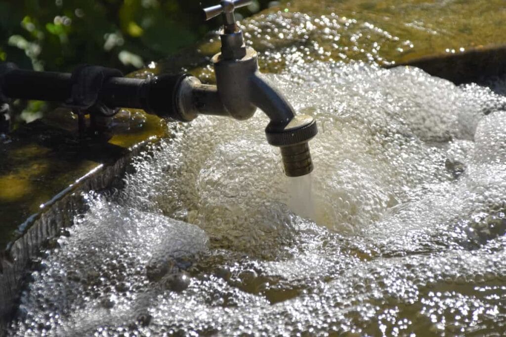 water coming out of a faucet