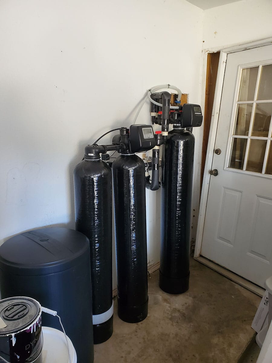 A recently installed whole-home water softening system.