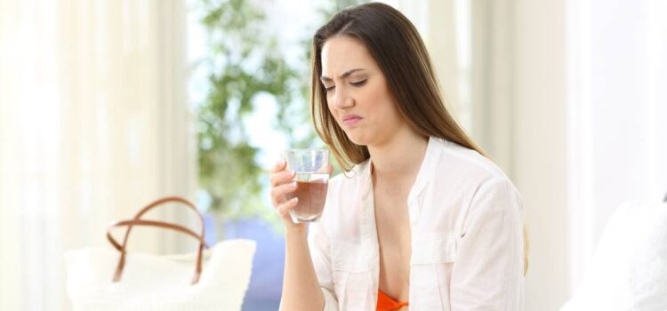 Woman disgusted by the taste and quality of the drinking water and needs Houston water softening